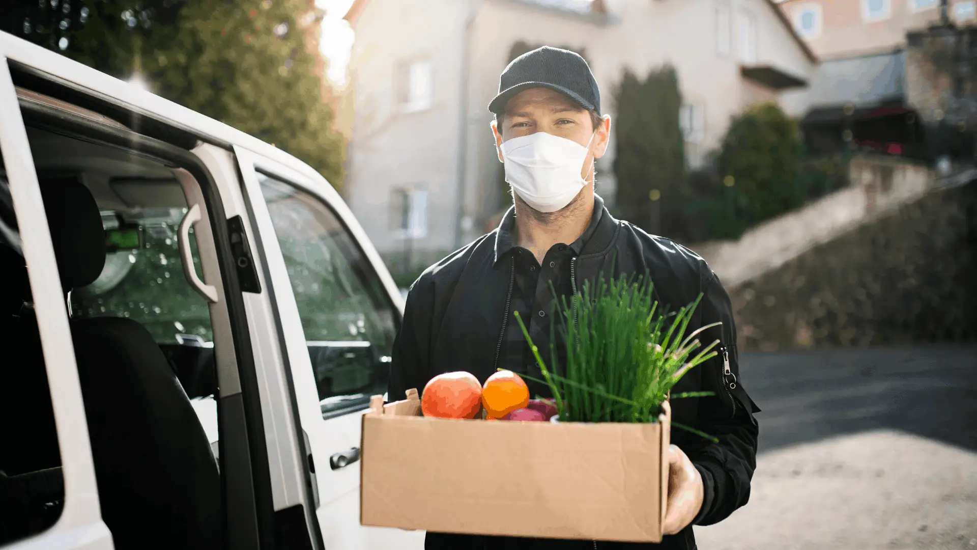 man carrying groceries