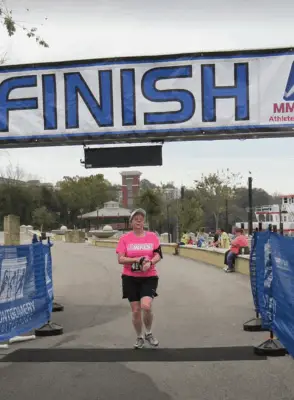 woman in pink shirt running