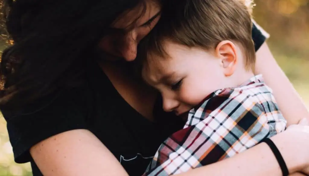 mother comforting child