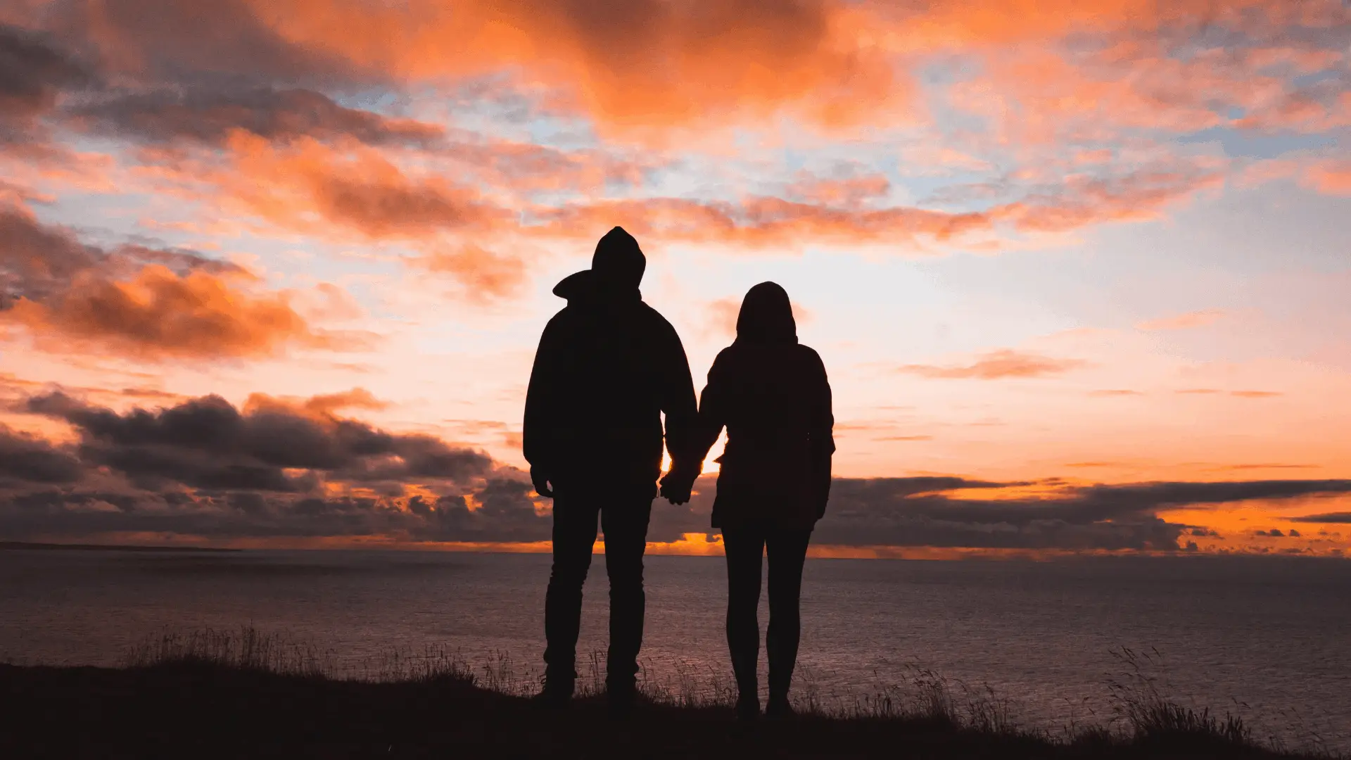 couple holding hands