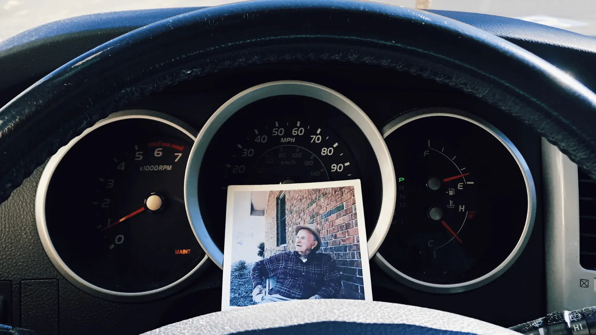 photo of papa on dashboard