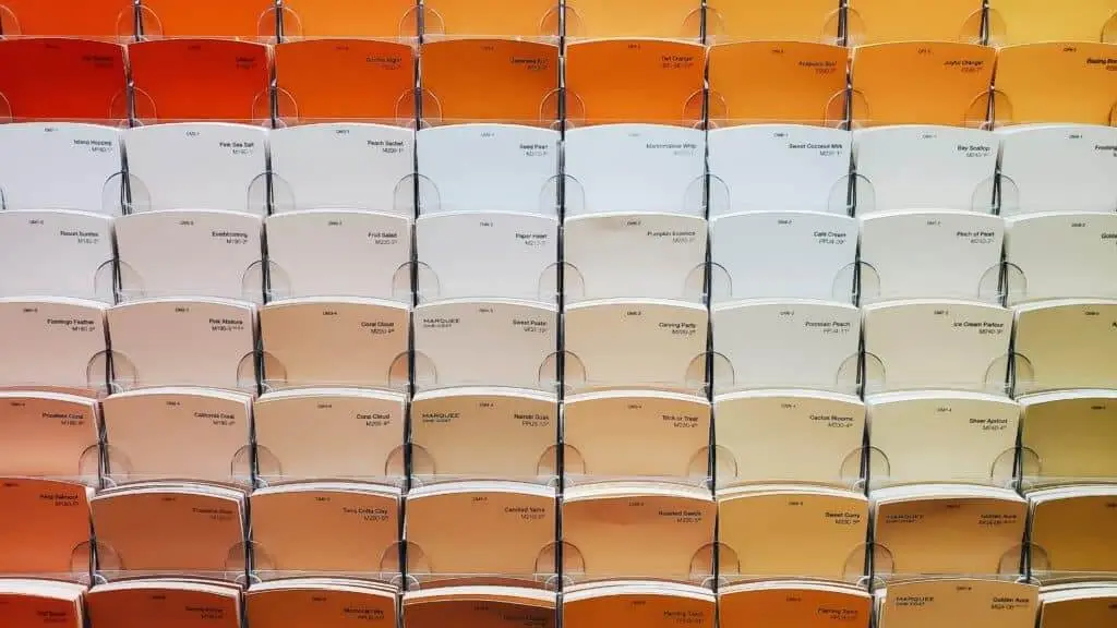 wall with orange yellow and white paint swatches