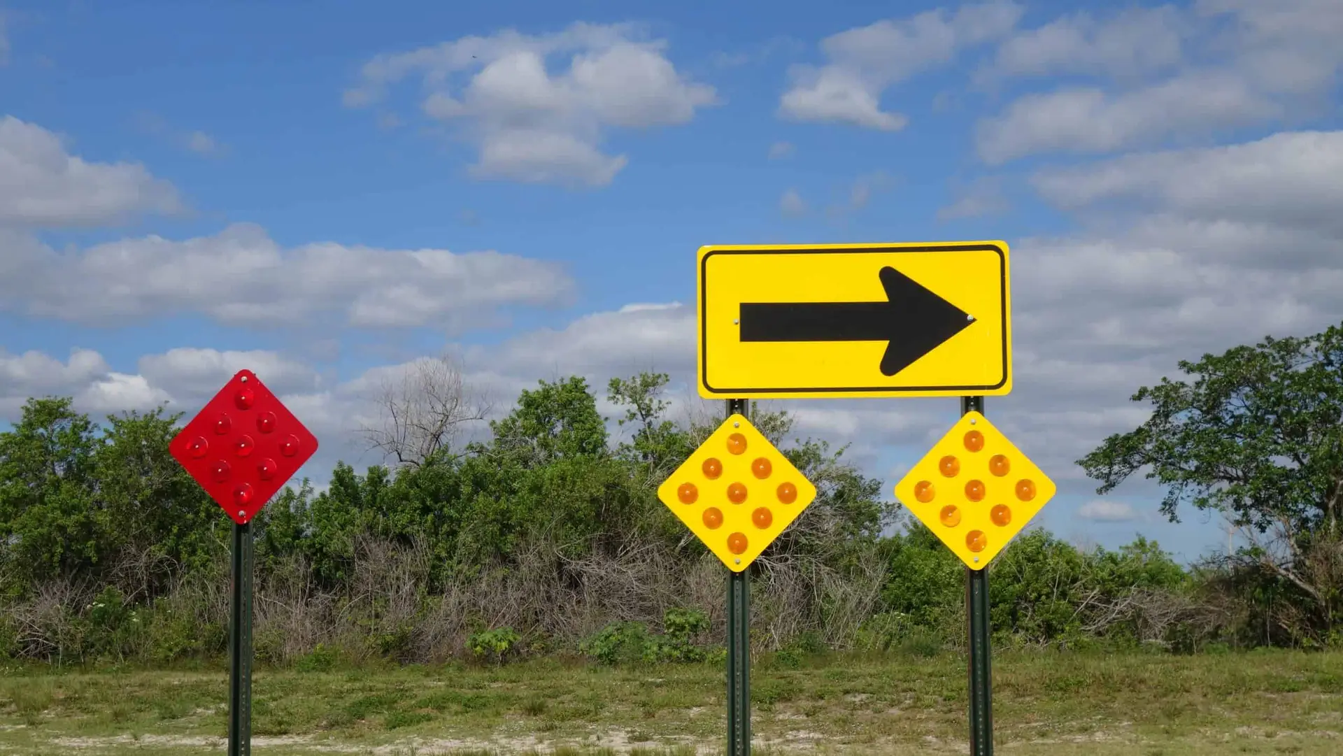 yellow right turn only road sign