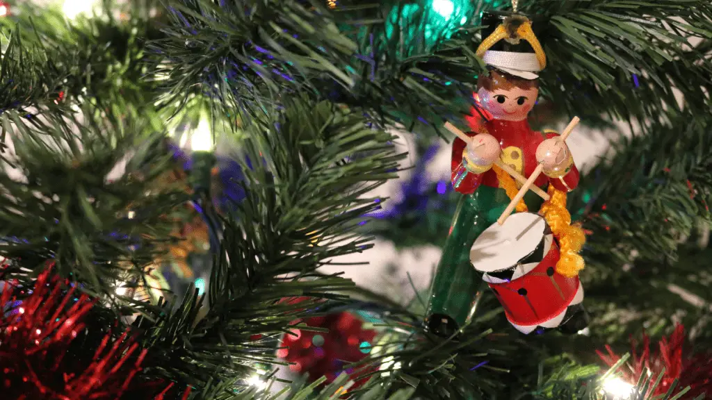 closeup of little drummer boy ornament on christmas tree