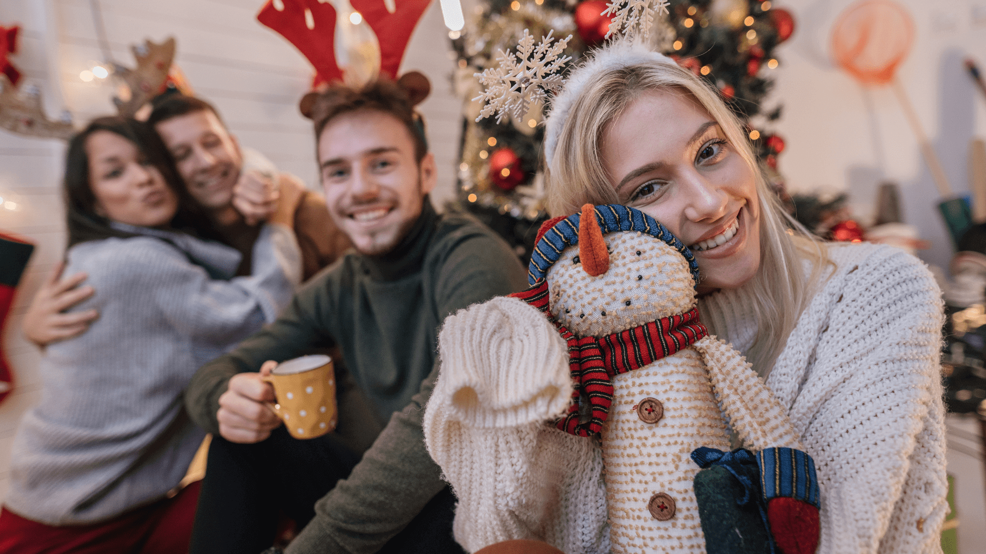 group of young people at fun christmas party