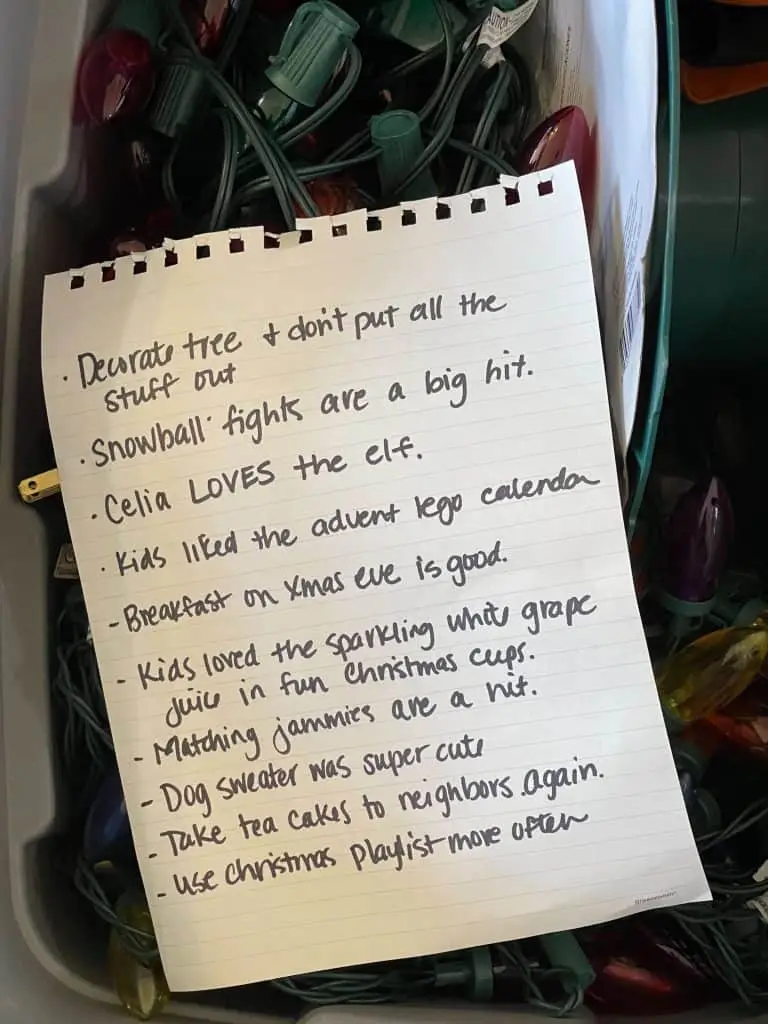 handwritten note of holiday reminders and tips for packing away holiday decor