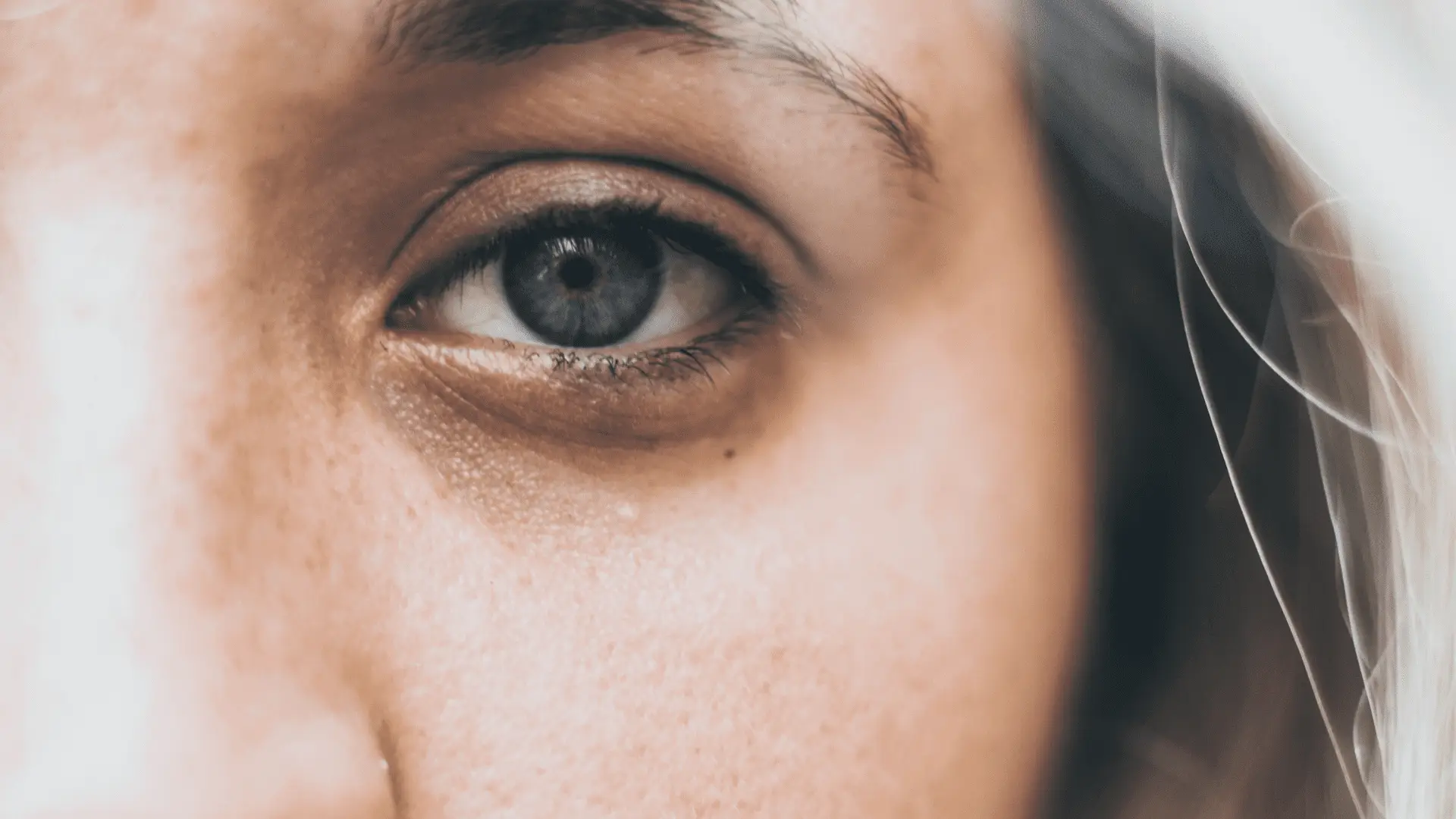 closeup of woman's blue eye